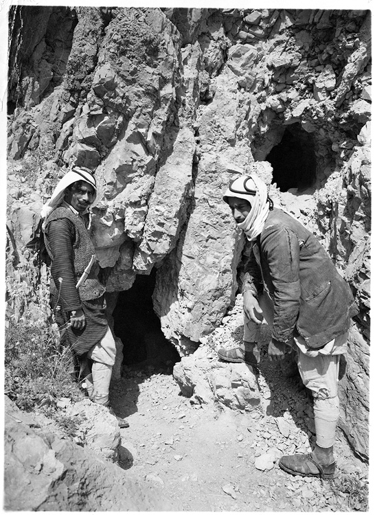 Muhammed ed-Dib and Jum'a Muhammed Khalil at the entrance to Cave 1, Qumran